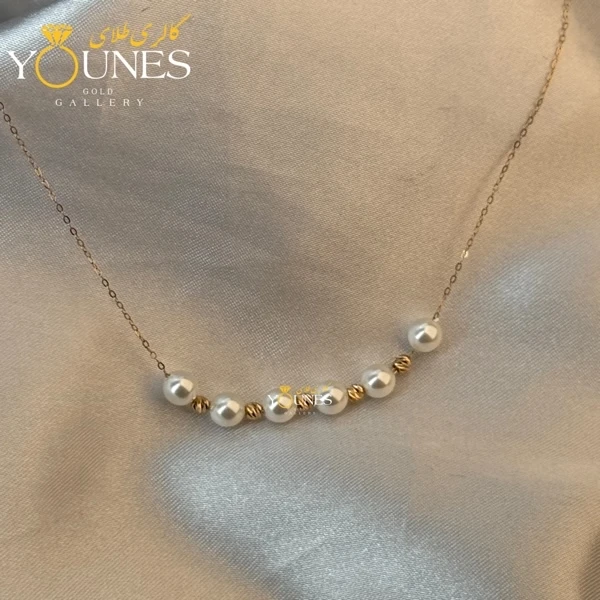تصویر دوم گردنبند مروارید و گوی طلا